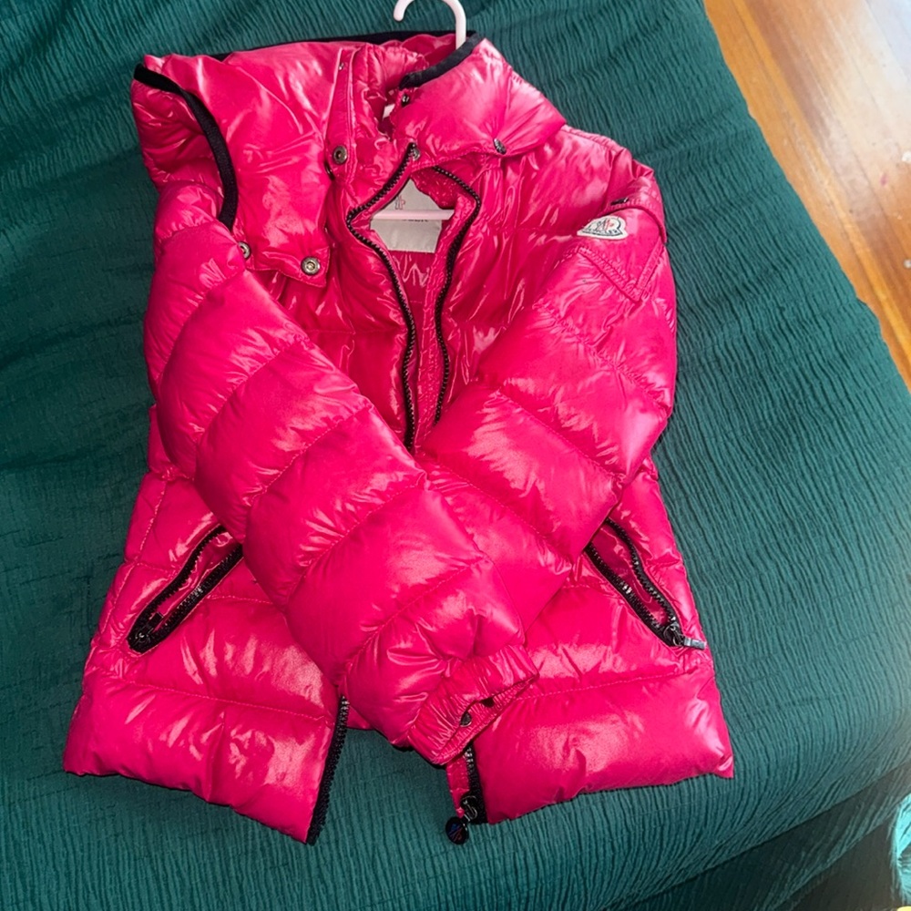 Pink Girls Moncler coat with detachable hood.